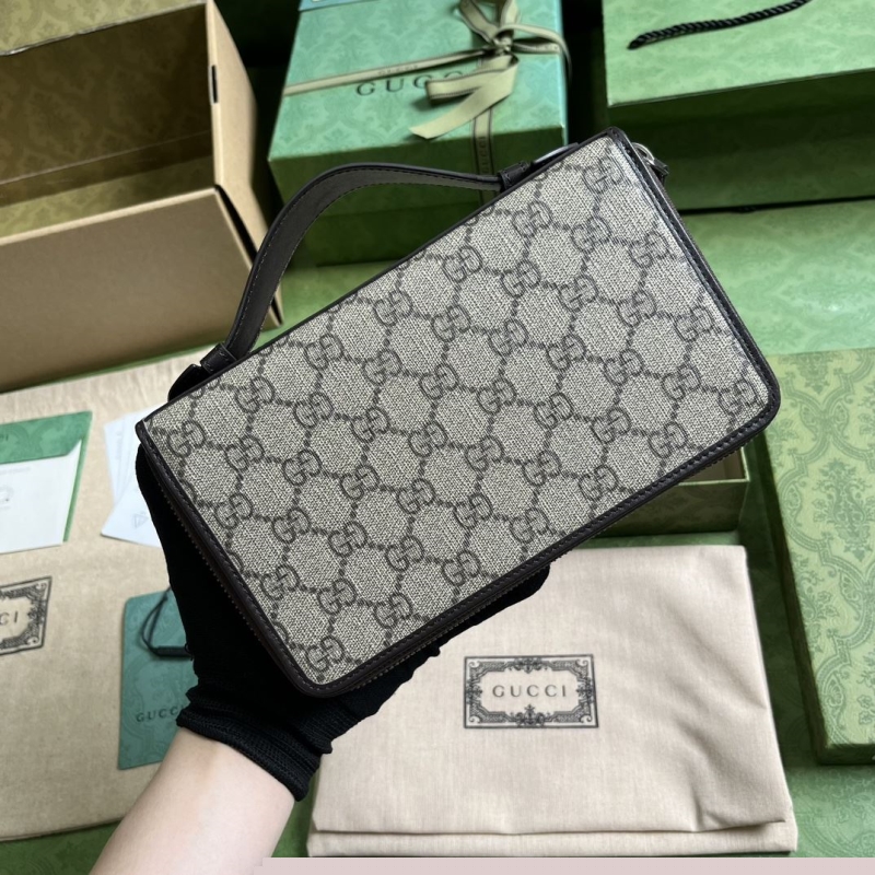 G*u*i clutch bags